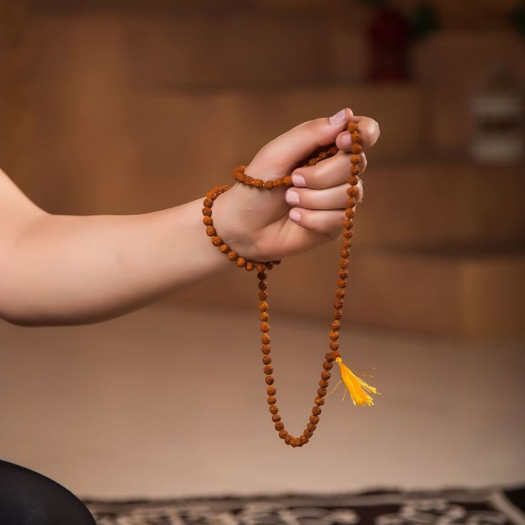 Image of the 11 Mukhi Rudraksha bead Mantra to chant symbolizing strength, wisdom, and spiritual growth.