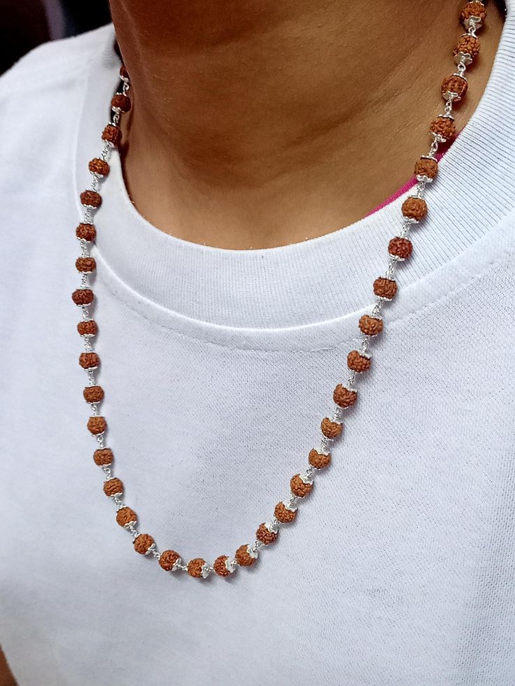 Image of the 11 Mukhi Rudraksha bead symbolizing strength, wisdom, and spiritual growth.